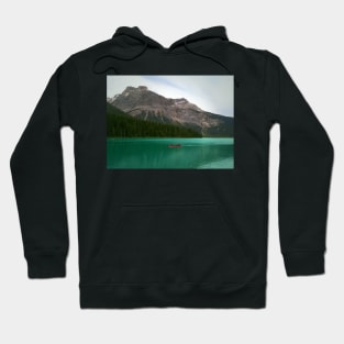 A Red Canoe on Emerald Lake Hoodie